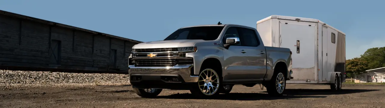 Truck hauling large enclosed trailer